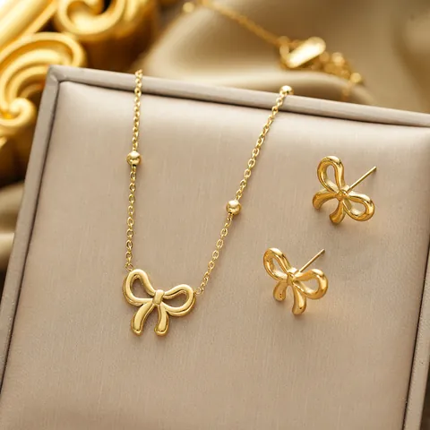 Ensemble de Bijoux Collier Pendentif Nœud Papillon en Acier Inoxydable Boucles d'Oreilles pour Femme Chaîne à Perles Or Argent