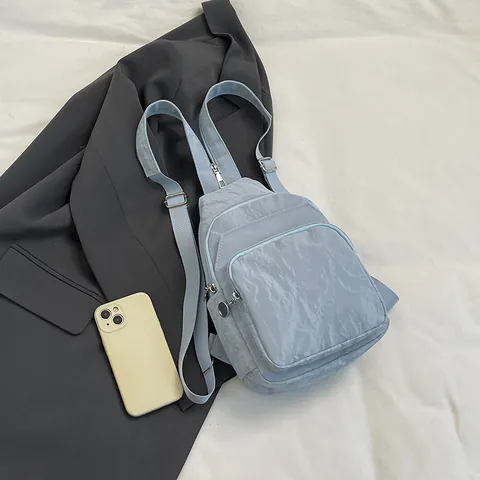 Damen Mode Falten PU Leder Brusttasche Casual Mehrere Taschen Leichte Umhängetasche Für Reise Alltag Mit Anhänger