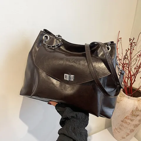 Dames Grote Capaciteit PU Leren Draagzak Mode Daisysluiting Woon-werk Schoudertas Met Ketting Riem Minimalistische Handtas