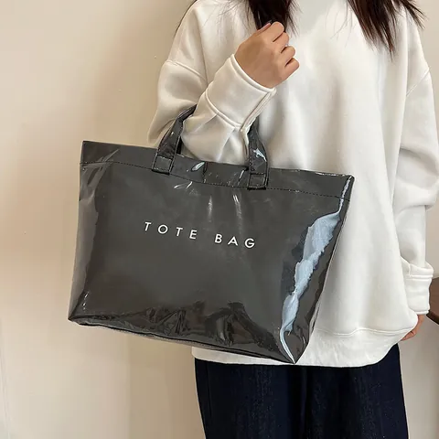 Damen Große Kapazität Wasserdicht PVC Kraftpapier Tragetasche Transparent Jelly Handtasche Street Trendy Buchstaben Schultertasche