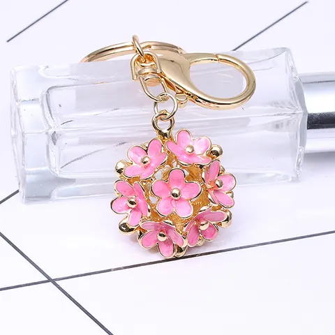 Porte-clés Femme Style Coréen Alliage de Zinc Émail Marguerite Boule de Fleurs Or Ajouré Pendentif de Sac Bijoux Cadeau