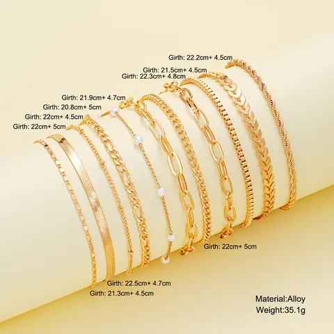 Ensemble de Chevillères et Bracelets de Cheville Multicouches en Alliage d'Or Bohème pour Femmes Bijoux de Vacances à la Plage avec Pendentifs Papillon Coeur Marguerite et Accents de Perles