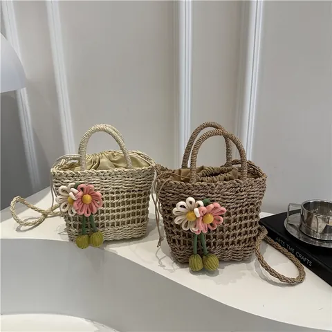 Handmade Straw Woven Bucket Bag For Women Summer Beach Vacation Hollow Mesh Handbag With Knit Flower Pendant Drawstring