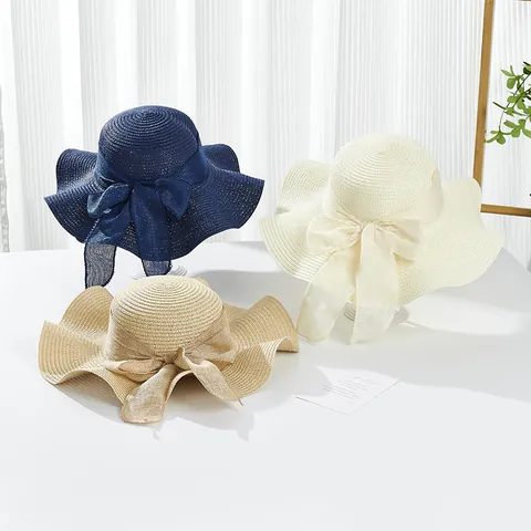 Women Elegant Paper Straw Sun Hat Large Wavy Brim Bowknot Beach Hat Summer Breathable UV Protection Foldable Vacation Cap