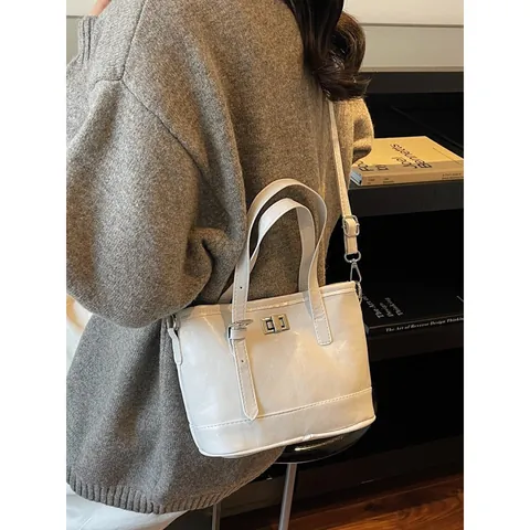 Bolso Cubo de Cuero PU Vintage para Mujer Diseño Coreano Bolso de Hombro Cruzado Con Cierre de Metal Color Sólido Tote Diario