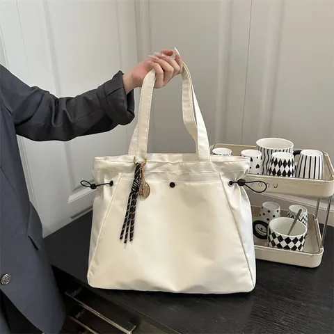 Women Large Capacity Nylon Tote Bag Urban Minimalist Casual Shoulder Bag With Drawstring Side Detail And Pendant For Office School Daily Use
