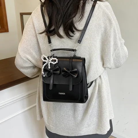 Women PU Leather Butterfly Bow Backpack Preppy Style Street Fashion Versatile Handbag With Artificial Pearl Heart Charm Mini Daypack