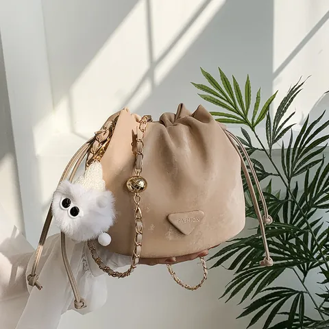 Fashion Women PU Leather Drawstring Bucket Bag Elegant Chain Strap Small Crossbody Shoulder Bag With Cute Fur Pendant