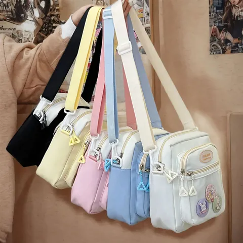 Süße Nylon Ita Bag Für Damen Koreanischer Stil Transparente PVC Fenster Umhängetasche Mit Cartoon Hasen Abzeichen Schultertasche