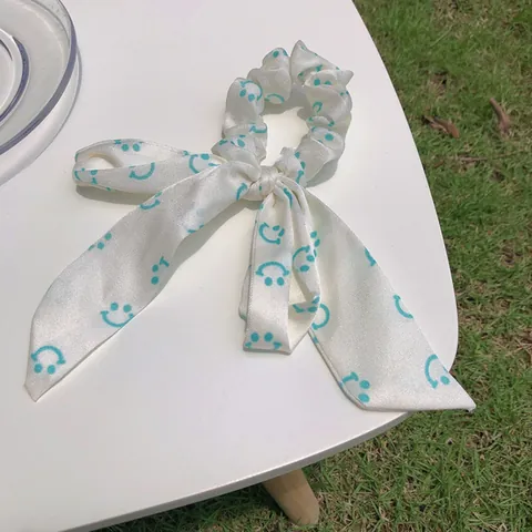 Dolce Elastico per Capelli in Raso Bianco Crema Con Lunghi Nastri a Fiocco Motivo Faccina Sorridente Accessori per Capelli Donna