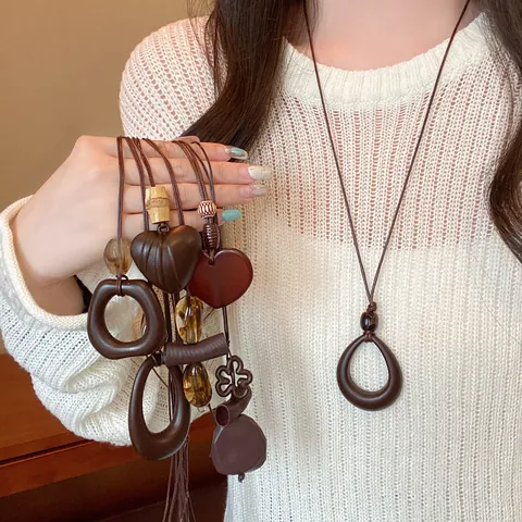 Collar de Pendiente de Madera y Resina Geométrico Retro Estilo Chino Para Mujer Corazón Calado Flor Cadena Larga Suéter