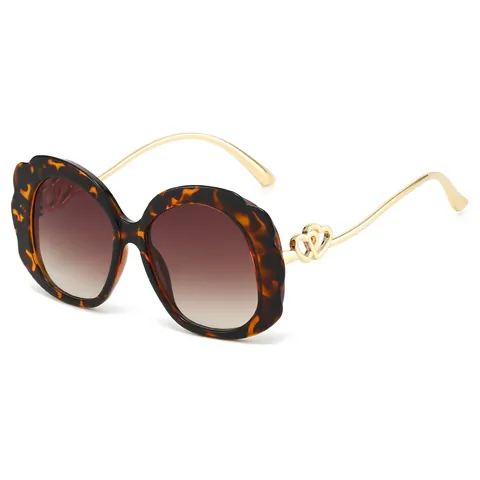 Damen Fashion Oval Sonnenbrille Wellenkante Rahmen Hohlherz Metallbügel UV400 Schutz PC Gläser Retro Dekorative Brillen