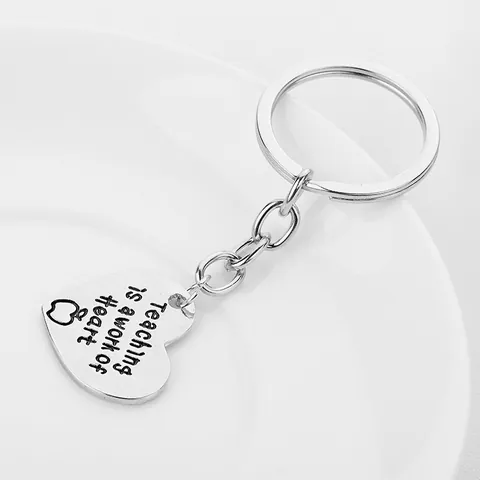 Portachiavi Teaching Is A Work Of Heart in Lega a Forma di Cuore Con Icona Mela Regalo Ringraziamento Insegnante Metallo Argento