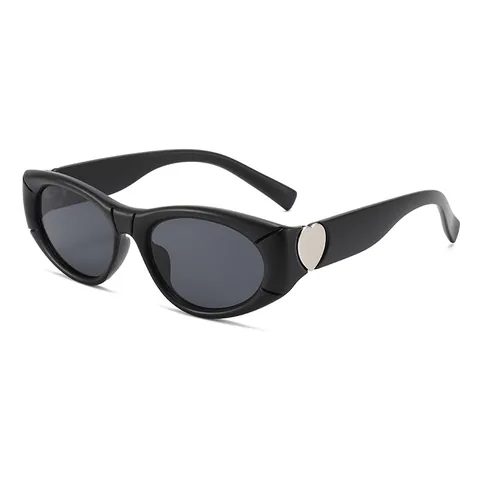 Occhiali da Sole Cat Eye Vintage da Donna Decorazione in Metallo a Cuore Protezione UV400 Montatura PC Ovali Moda