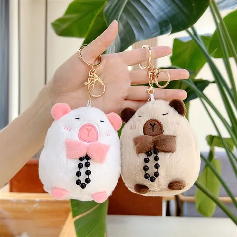 Simpatico Portachiavi in Peluche di Capibara Con Perline e Papillon Morbido Animale di Peluche Ciondolo per Borsa per Donna Bambini Regalo