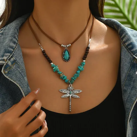 Set Collana Doppia Boho Vintage Pendente Libellula Goccia d'Acqua Turchese Sintetico Perline in Legno Cordino Camoscio Gioielli Etnici