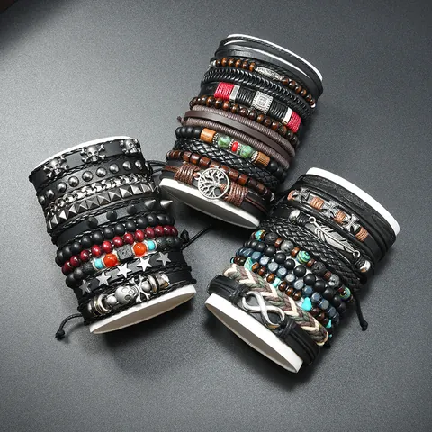 Set di Bracciali in Pelle Multistrato Intrecciata retrò per Uomo Donna Stile Punk Bohemian Con Ciondolo Albero Della Vita Teschio Piuma Gioielli