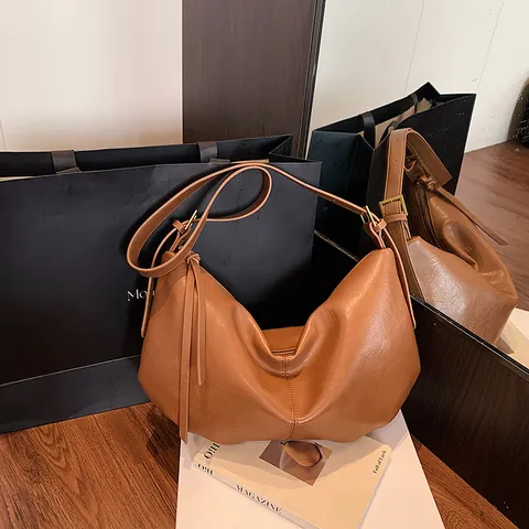 Women PU Leather Hobo Shoulder Bag Large Capacity Solid Color Slouchy Dumpling Crossbody Bag Minimalist Retro Tassel Purse