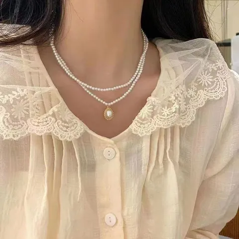 Elegante Collana di Künstliche Perle Camelia per Donna Placcata in Oro Rame Farfalla Cuore Ciondolo Chiusura a Scomparsa Gioielli Vintage Regalo