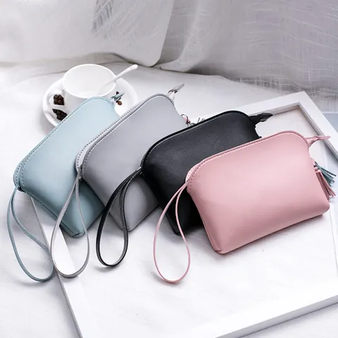 Damen Minimalistische PU-Leder Mini Handgelenktasche Quaste Reißverschluss Münzbörse Kleine Handytasche Mode Handheld Clutch Tasche