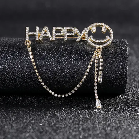 Broche en Alliage d'Or Tendance Lettre HAPPY Avec Visage Souriant Strass Gland Épingle pour Femmes Bijoux Décoratifs de Mode Cadeau