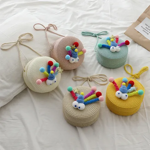 Bolso Bandolera para Niñas con Diseño de Monstruo de Ojos Grandes de Paja Tejida Mini Monedero Redondo con Adorno de Bola de Pelo