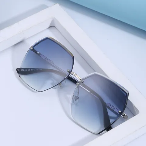 Occhiali da Sole Donna Senza Montatura Taglio Diamante Grandi Geometrici Lenti in Nylon Montatura in Lega TR90 UV400 Trendy