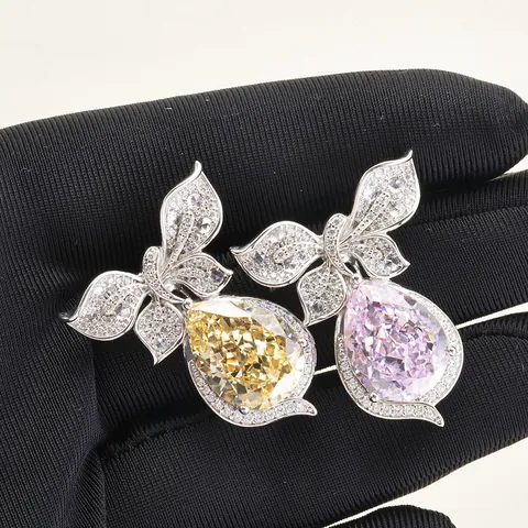 Luxurious 10 Carat Pear Cut Yellow Pink High Carbon Diamond Pendant 925 Sterling Silver Bowknot Inlaid Zirconia Jewelry For Women Pendant Only Without Chain