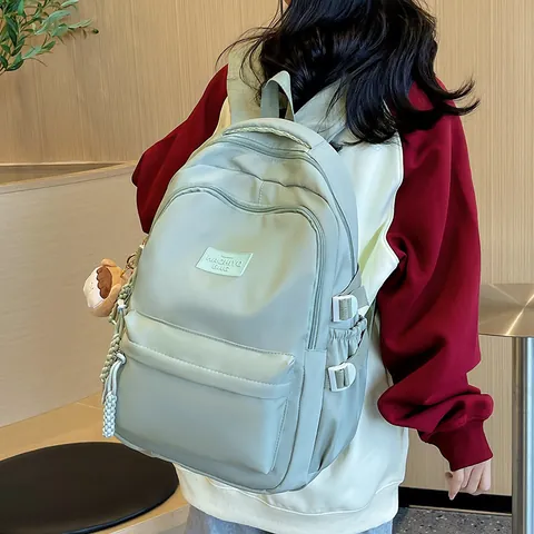 Grote Capaciteit Nylon Schoolrugzak Effen Kleur Preppy Stijl Student Daypack Met Leuke Hanger Voor Meisjes Vrouwen College Reistas