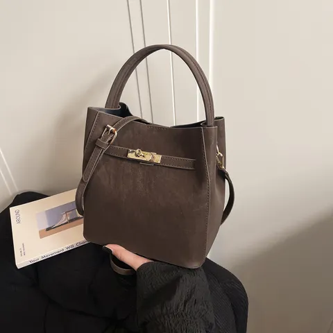 Dames Retro PU Suède Bucket Bag Met Gouden Slot Verstelbare Band Vintage Effen Kleur Crossbody Schoudertas Hoofdtas En Tasje