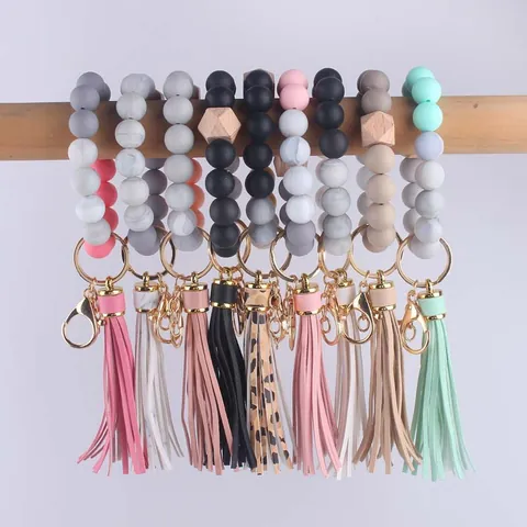 Silicone Beaded Wristlet Keychain With PU Leather Tassel And Wood Bead Elastic Wrist Strap Key Ring For Women Gift