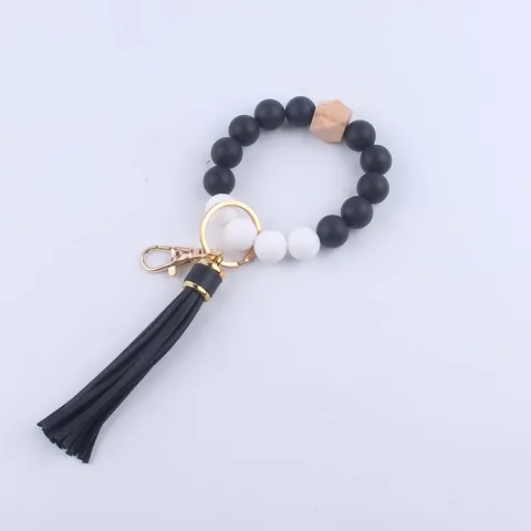 Silikonperlen Schlüsselanhänger Armband Boho Buchenholz Achteckige Perle Kunstleder Quaste Handgelenk Schlüsselanhänger Für Damen Tasche Anhänger