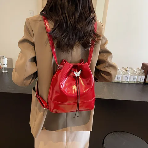 Women Vintage PU Leather Bucket Bag Minimalist Solid Color Drawstring Shoulder Bag With Butterfly Metal Decor Backpack