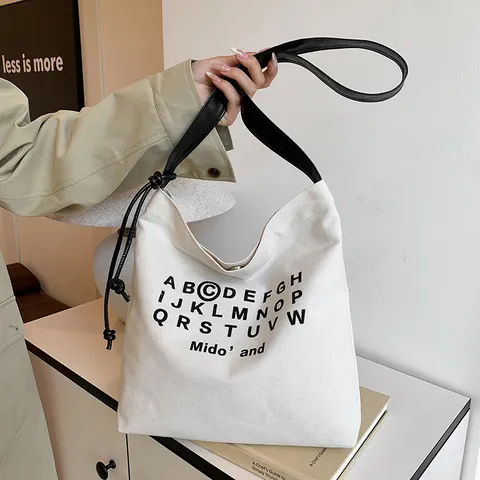 Damen Casual Segeltuch Tragetasche Große Kapazität Buchstabendruck Umhängetasche Für Schule Pendeln Street Style Handtasche Mit Magnetverschluss