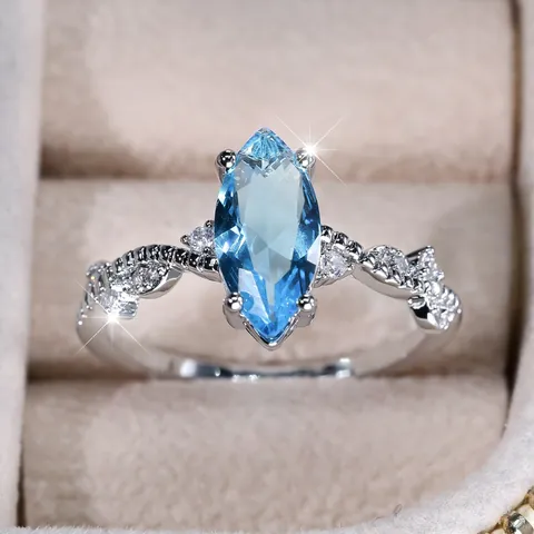 Marquise Cut Sea Blue Zircon Ring For Women Silver Plated Copper Intertwined Band Sparkling Rhinestone Wedding Party Jewelry