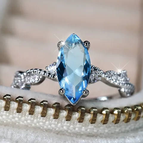 Marquise Cut Sea Blue Zircon Ring For Women Silver Plated Copper Intertwined Band Sparkling Rhinestone Wedding Party Jewelry