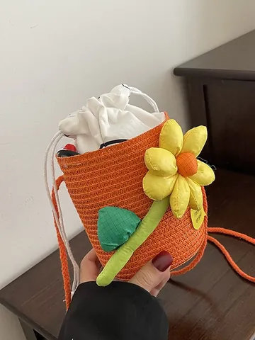 Women Mini Straw Bucket Bag Handwoven Flower Crossbody Bag For Girls Beach Holiday Bag With Sunflower Decoration And Drawstring