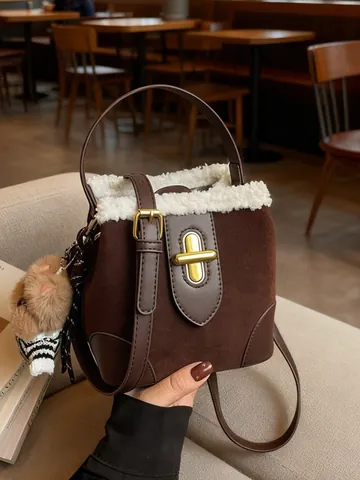 Women Vintage Suede-Look Bucket Bag With Faux Shearling Trim Retro PU Handbag Rotating Lock Crossbody Bag With Plush Charm