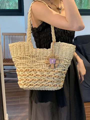 Women Straw Woven Tote Bag Large Capacity Hollow Design With Flower Pendant Handmade Shoulder Bag For Summer Beach Vacation