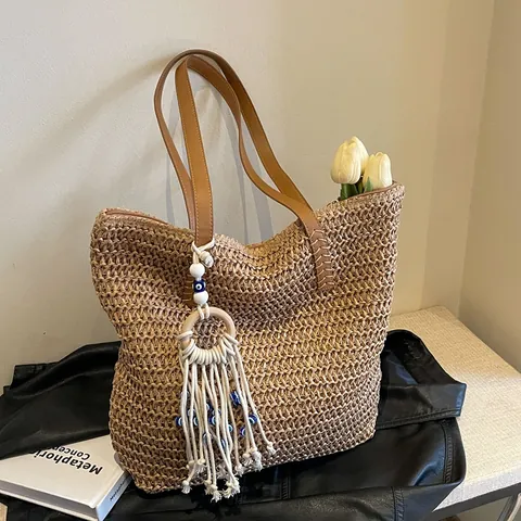 Bolso Tote De Paja Tejida Para Mujer De Gran Capacidad Bolso De Hombro Con Correa De Cuero PU Y Colgante De Borla De Mal De Ojo