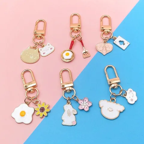 Süßer Cartoon Legierung Emaille Schlüsselanhänger Tier Katze Hase Sonnenblume Küchenutensilien Anhänger Dekorative Tasche Charme Für Damen Teenager Mädchen