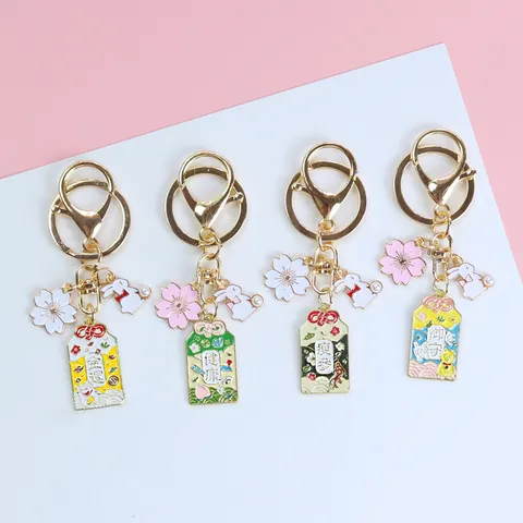 Portachiavi Omamori Sakura in Stile Giapponese per Donna Ragazze Simpatico Coniglio Perla Artificial Fiore di Ciliegio Lega Smalto Gatto della Fortuna Ciondolo per Borsa Auto Regalo