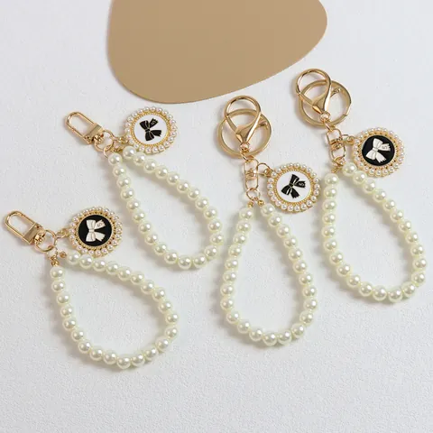 Vintage Pearl Bow Keychain Alloy Round Plate Pendant Hand Strap For Bag Phone Case Car Keys Accessories Women Jewelry