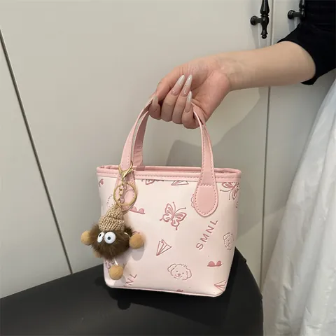 Women PU Leather Embossed Bucket Shoulder Bag With Plush Monster Keychain Small Cartoon Pattern Crossbody Handbag Fashion Bag