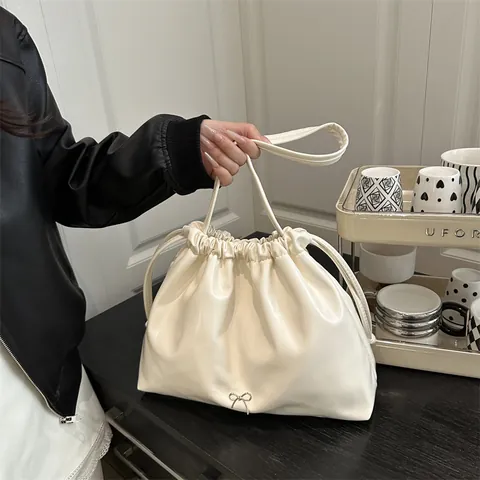 Women Glossy PU Leather Bucket Bag Large Capacity Drawstring Shoulder Bag With Metallic Bowknot Pleated Tote Handbag