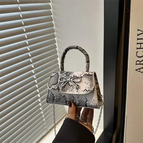 Women Vintage Snake Print Mini Crossbody Bag With Silver Metal Bow PU Leather Handbag Elegant Flap Magnetic Underarm Bag