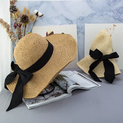 Women's Wide Brim Paper Straw Sun Hat With Large Black Bow Ribbon Foldable Wavy Edge Beach Vacation Sunshade Summer Hat