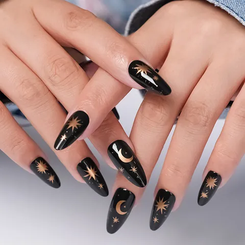 Unghie Finte a Pressione a Mandorla Stella Luna Oro Nero Unghie Finte Lucide Lunghe Stiletto Artificiali per Donne Ragazze Uso Quotidiano