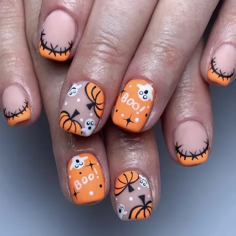 Unghie Finte Opache di Halloween Con Disegni di Zucca Fantasma Lettera Arancione Bianco Nero Forma Ovale Nail Art Festiva