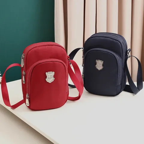 Dames Verticale Nylon Crossbody Mobiele Telefoontas Meerlaagse Rits Waterdichte Kleine Schoudertas Met Metalen Schild Decor
